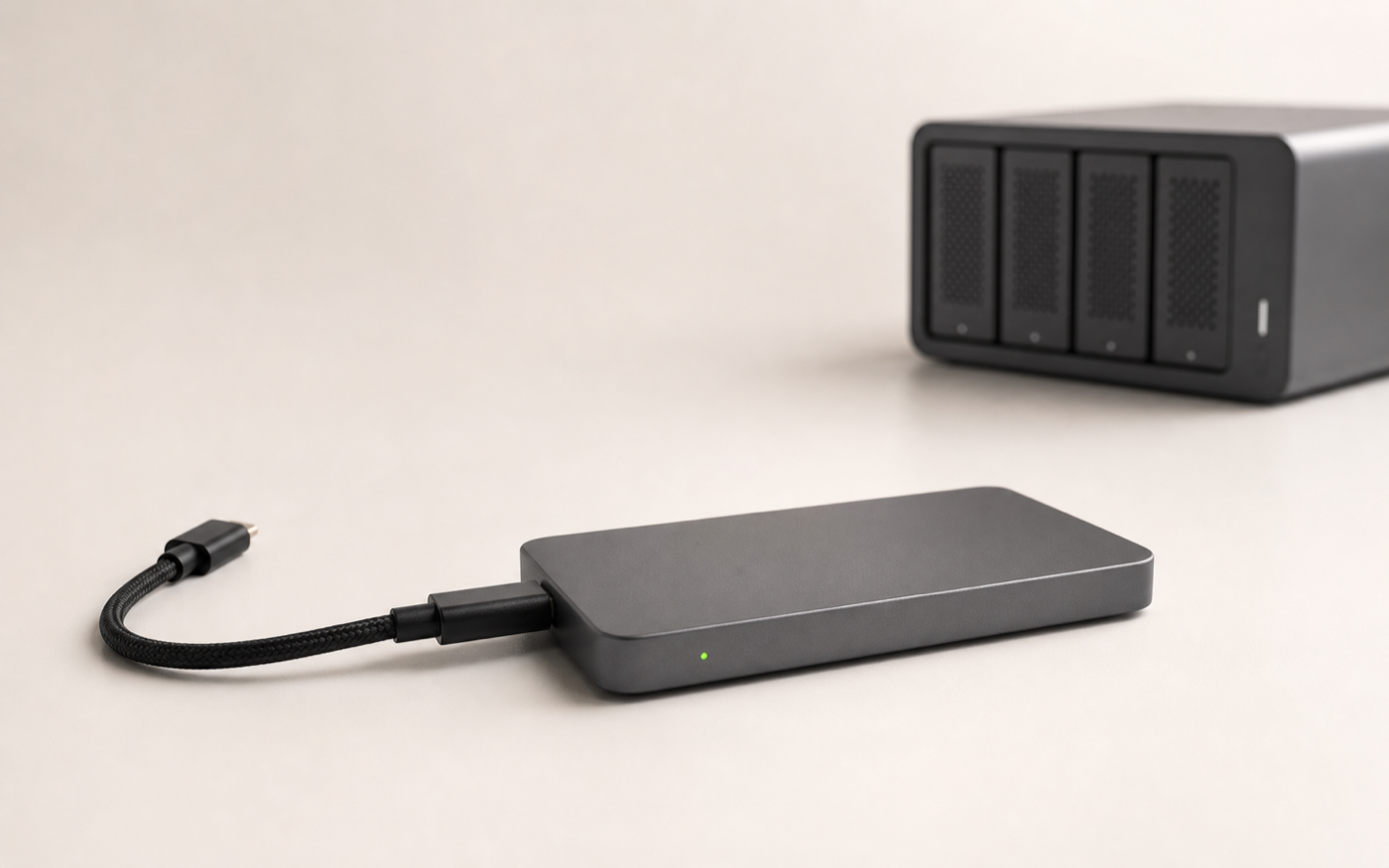 An external SSD and RAID used for a creative project handoff